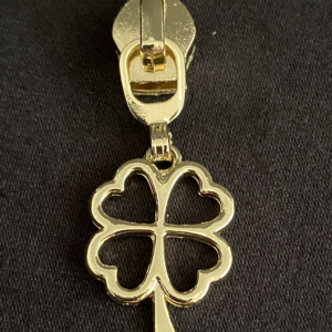 Zipper Glücksklee, breit, lang, hellgold